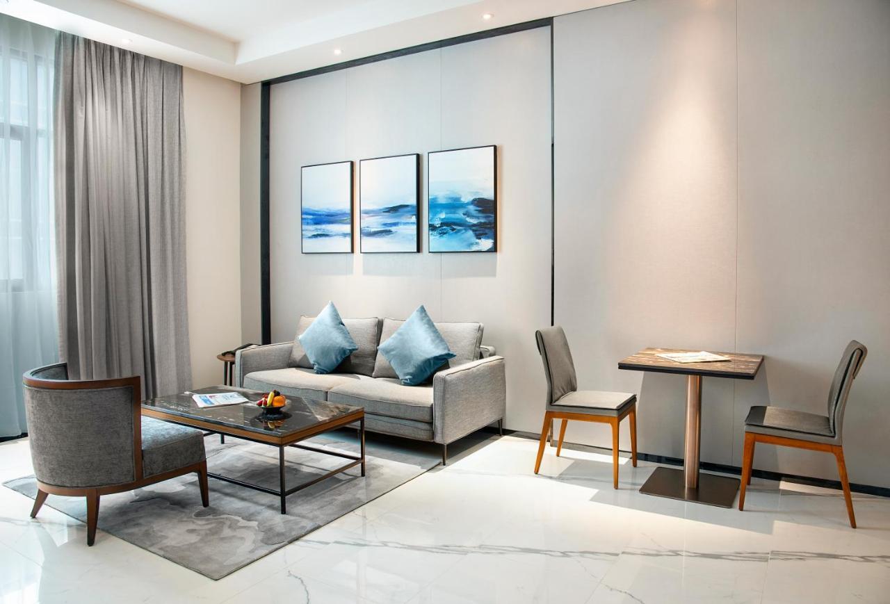 Asiana Grand Hotel Dubaj Exteriér fotografie A living room at the hotel