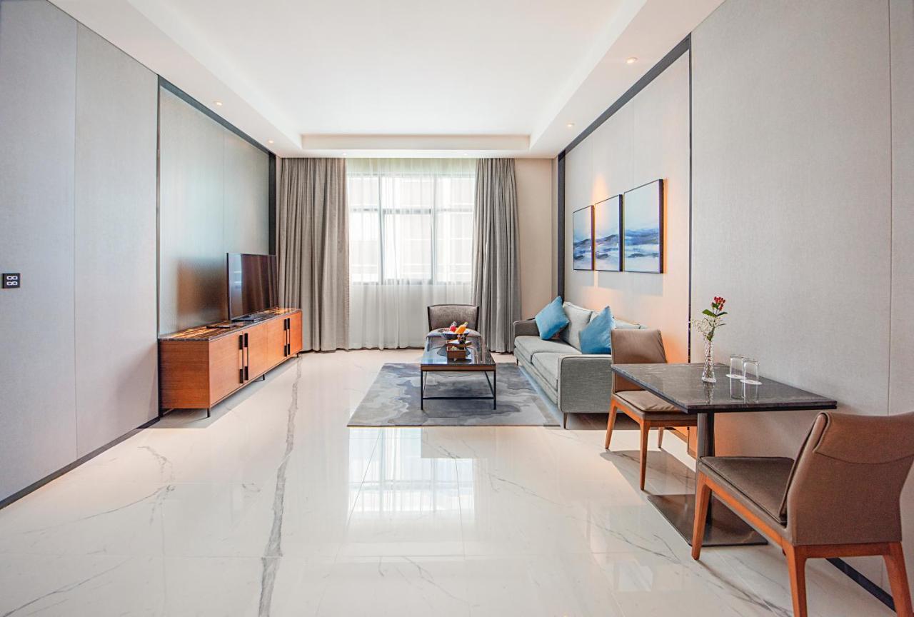 Asiana Grand Hotel Dubaj Exteriér fotografie A living room in a serviced apartment in Beijing, China